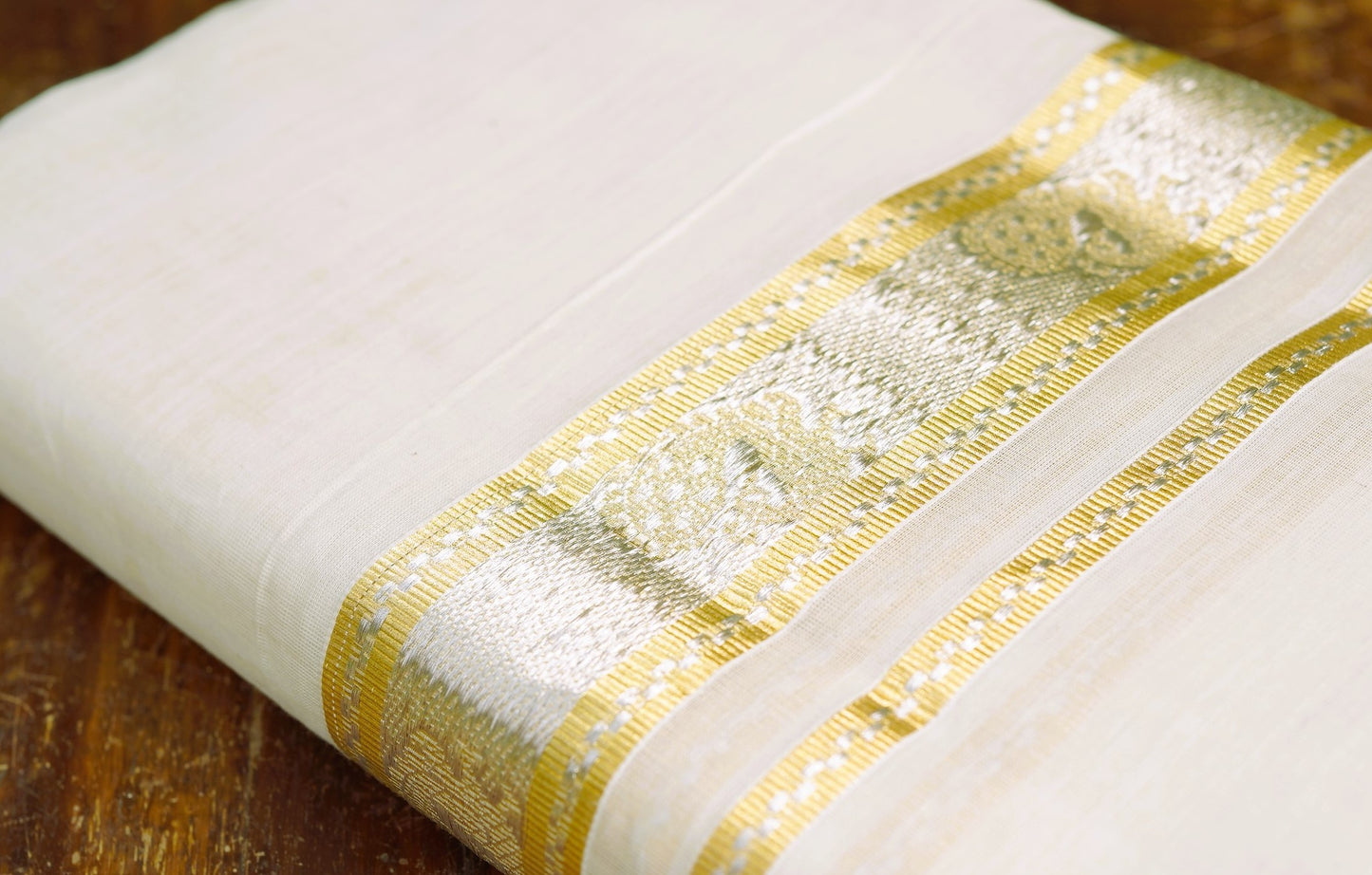 Premium Handloon Mundu With Peacock Handwoven Work In The Border