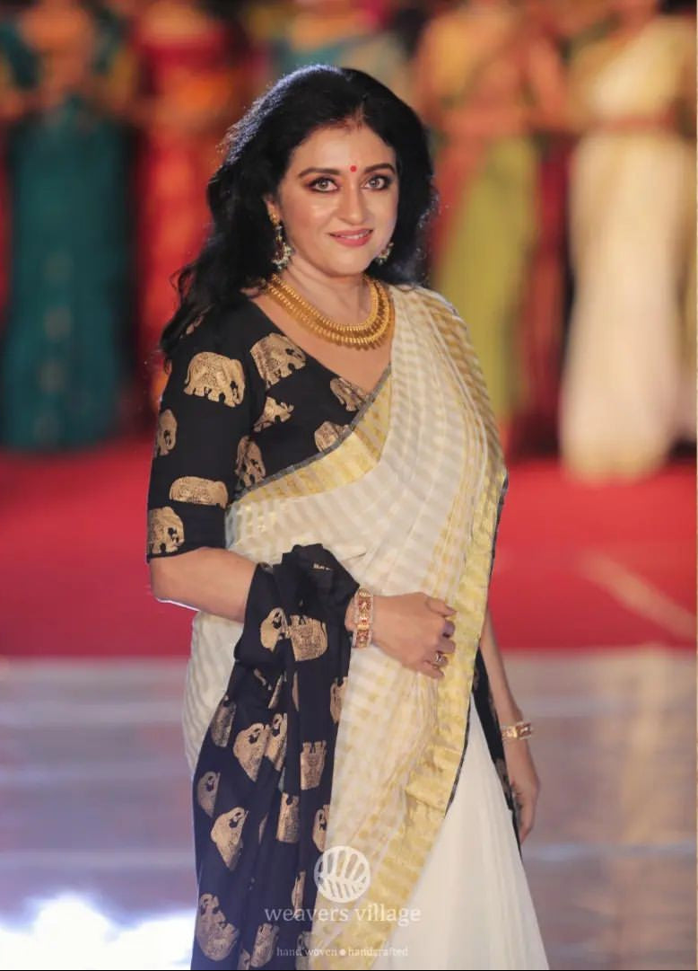 Actress Parvathy in Weavers Village designed saree